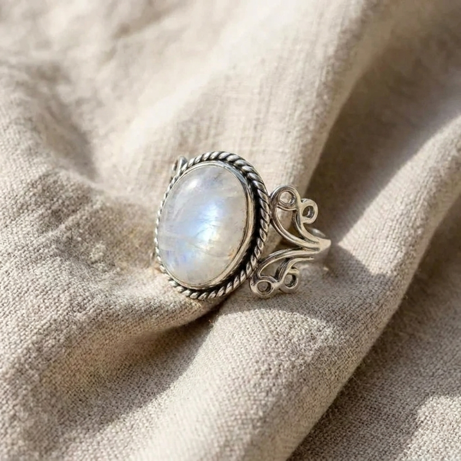 Oval Moonstone Ring with Scroll Band